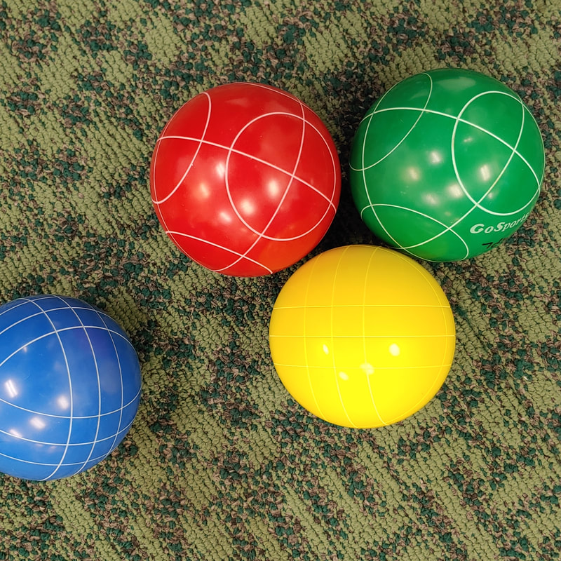 Four bocce balls